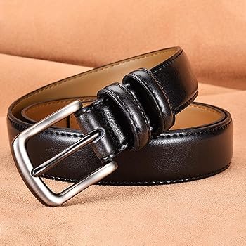 Black leather belt with silver buckle on a beige background